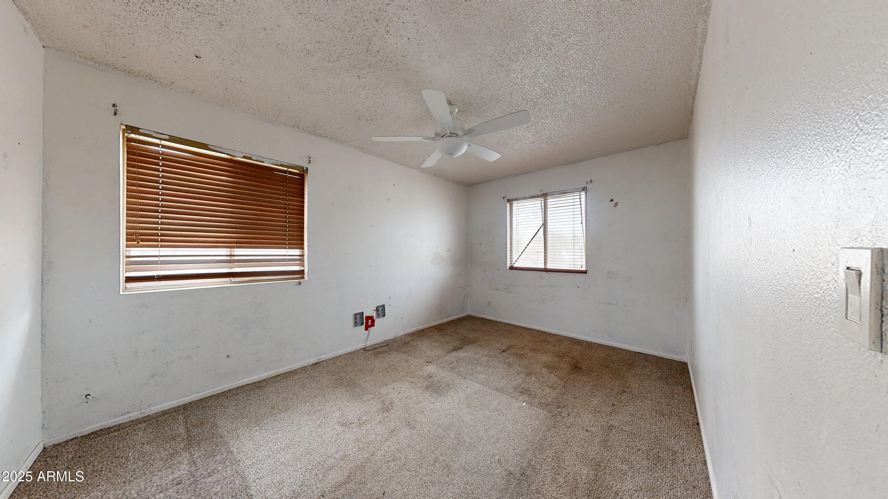2351 South Royal Palm Road Apache Junction, AZ 85119 - Photo 8 of 21 a view of an empty room with a window