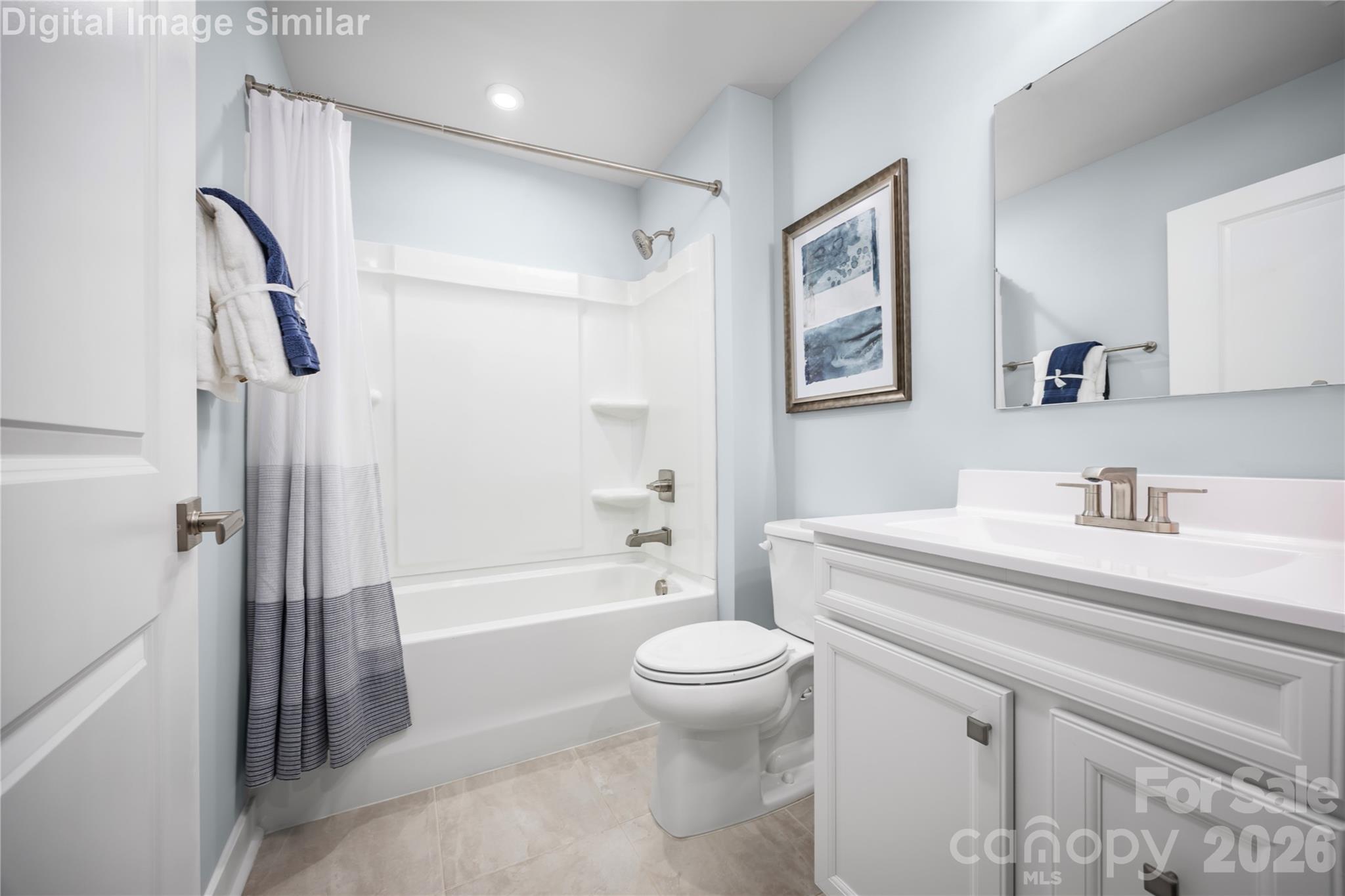 3274 Eller Drive Extension Hickory, NC 28602 - Photo 13 of 20 a bathroom with a sink a toilet and a tub