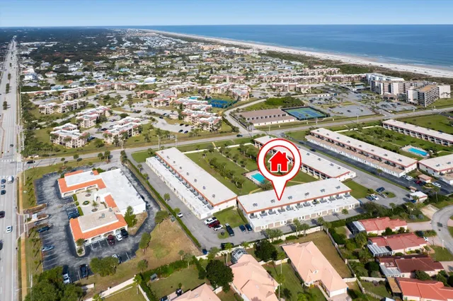 a view of an swimming pool with outdoor seating