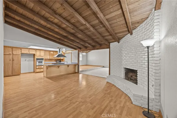 a view of a livingroom with wooden floor
