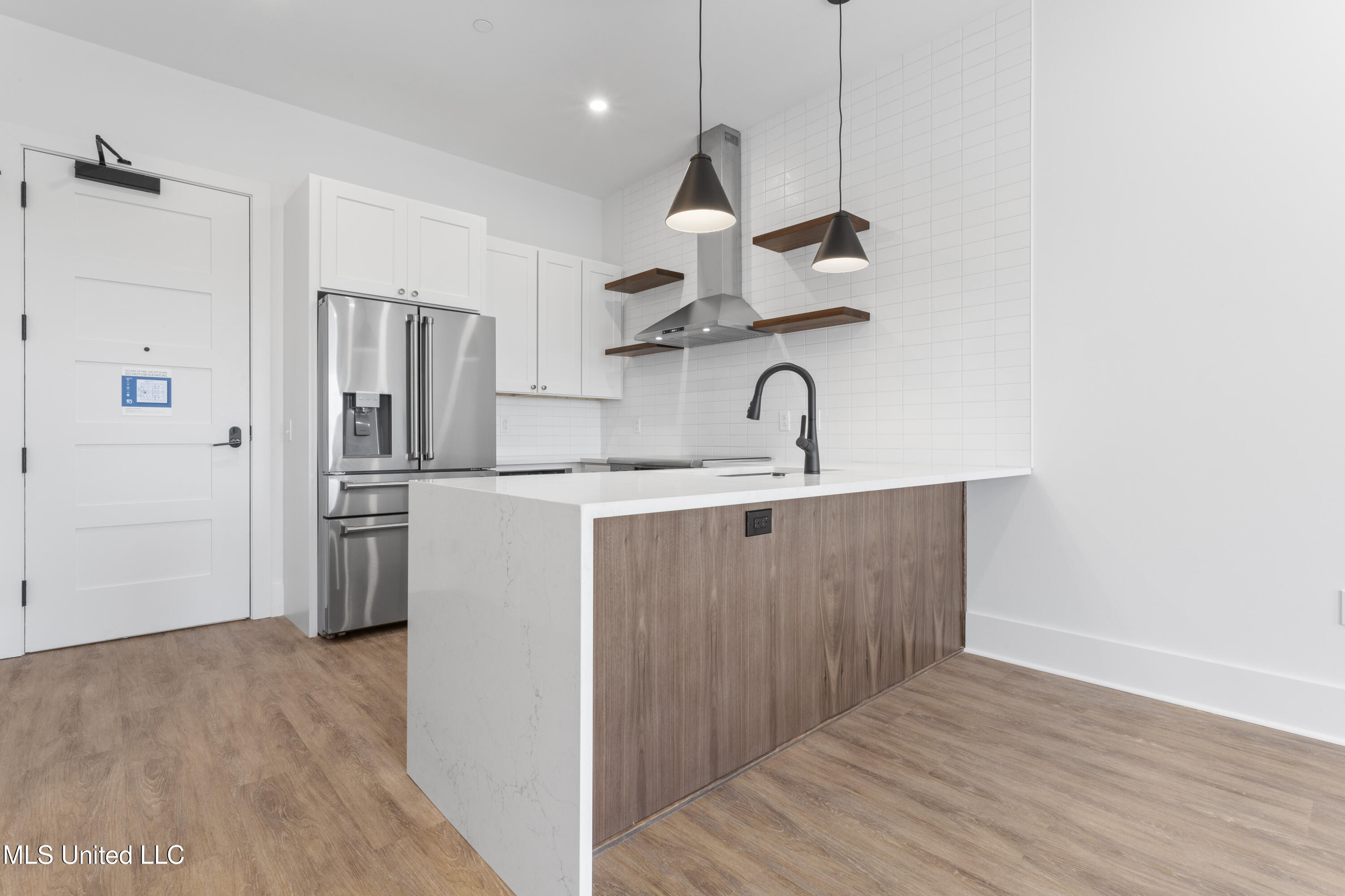 1515 Government Street, Unit A302 Ocean Springs, MS 39564 - Photo 6 of 38 Bright Kitchen