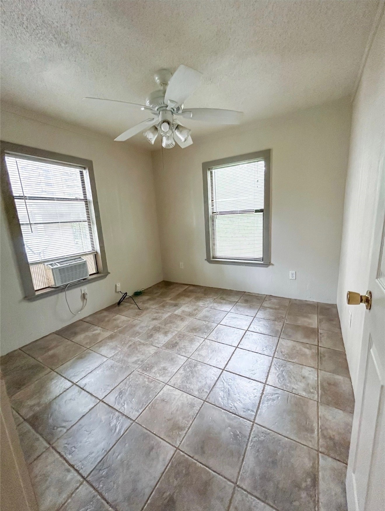 3005 Old Houston Road, Unit C Huntsville, TX 77340 - Photo 3 of 4 a view of an empty room with a window