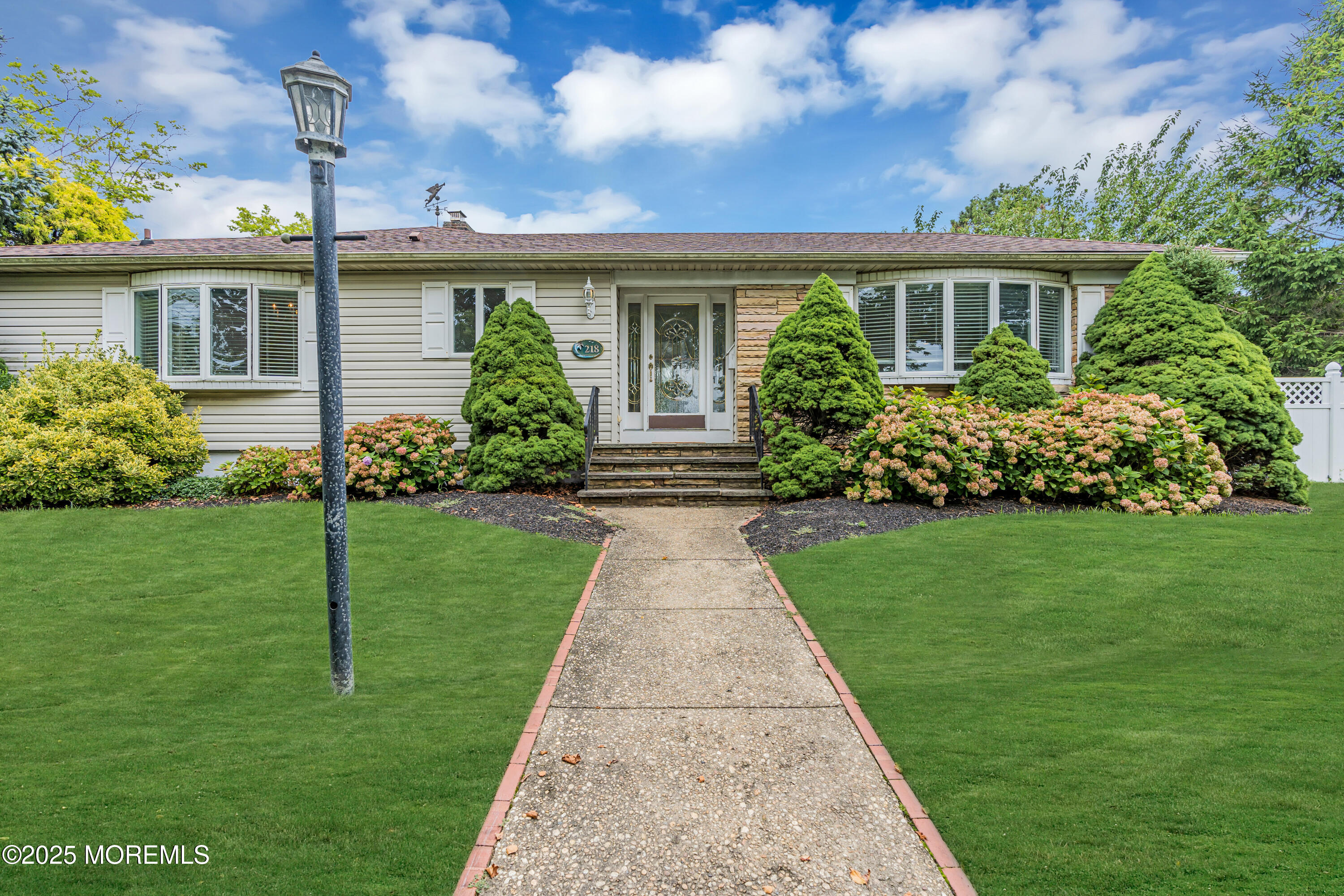 218 3rd Avenue Belmar, NJ 07719 - Photo 2 of 14 a front view of house with garden