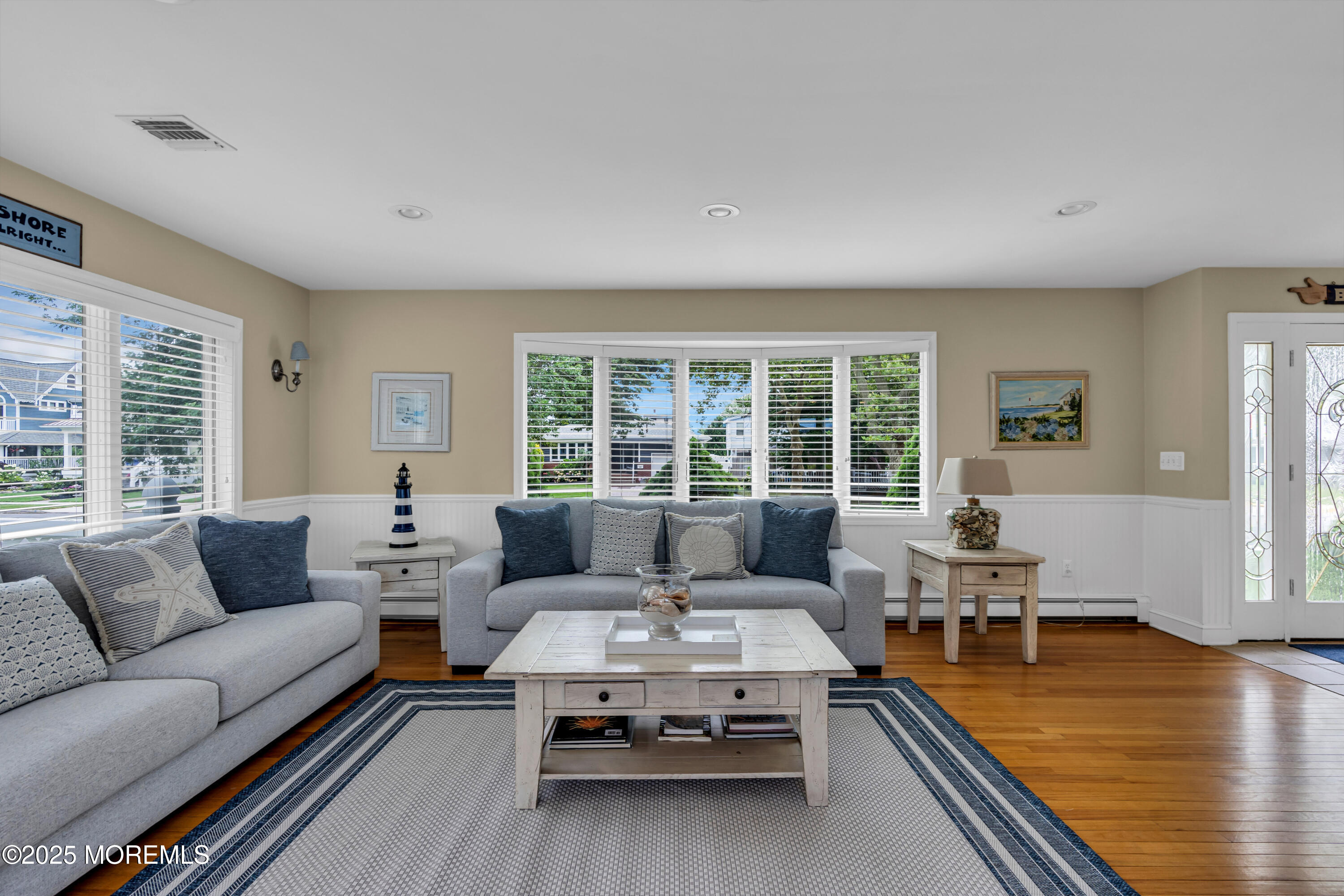 218 3rd Avenue Belmar, NJ 07719 - Photo 3 of 14 a living room with furniture and a large window