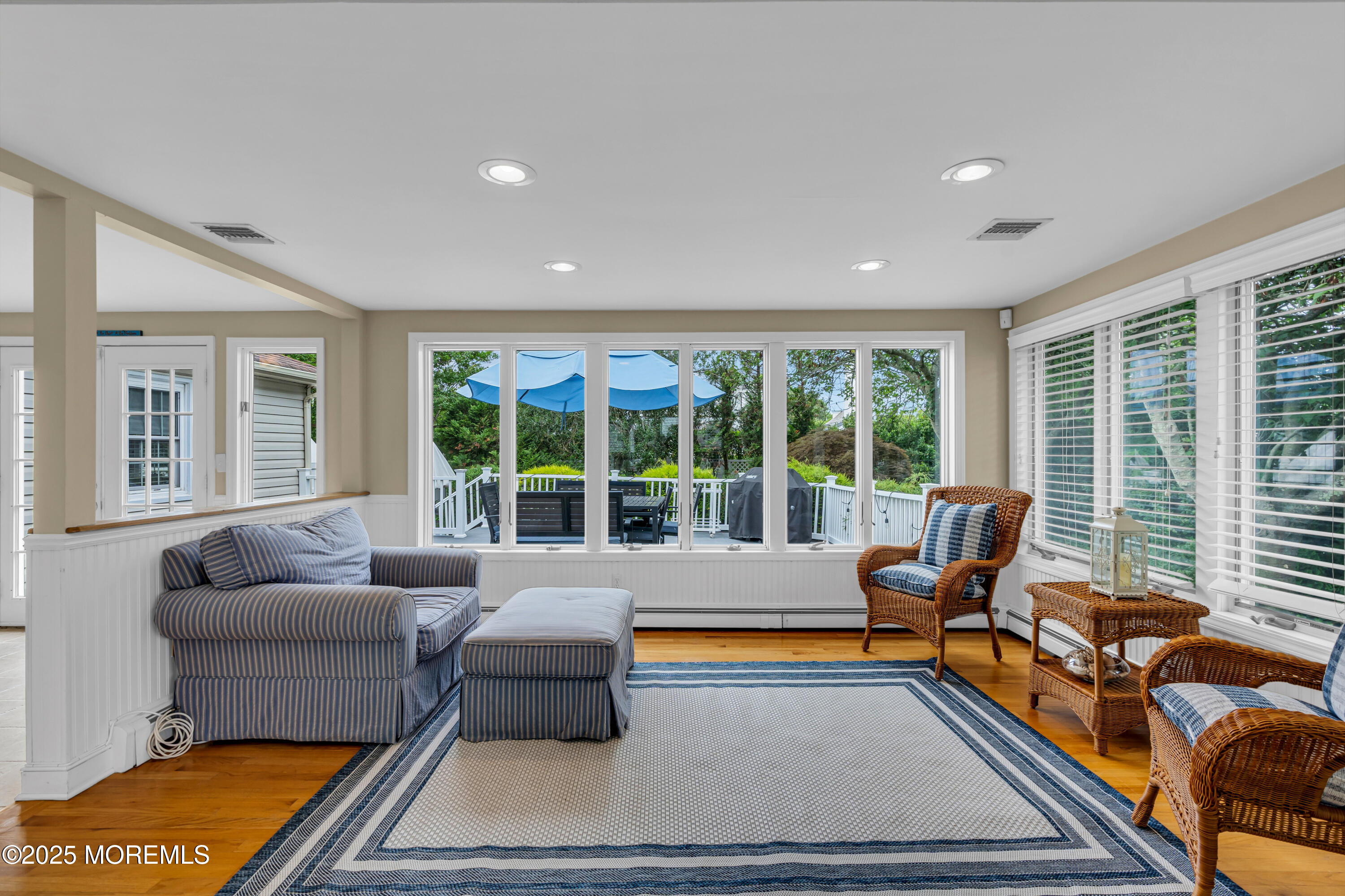 218 3rd Avenue Belmar, NJ 07719 - Photo 4 of 14 a living room with furniture and a large window