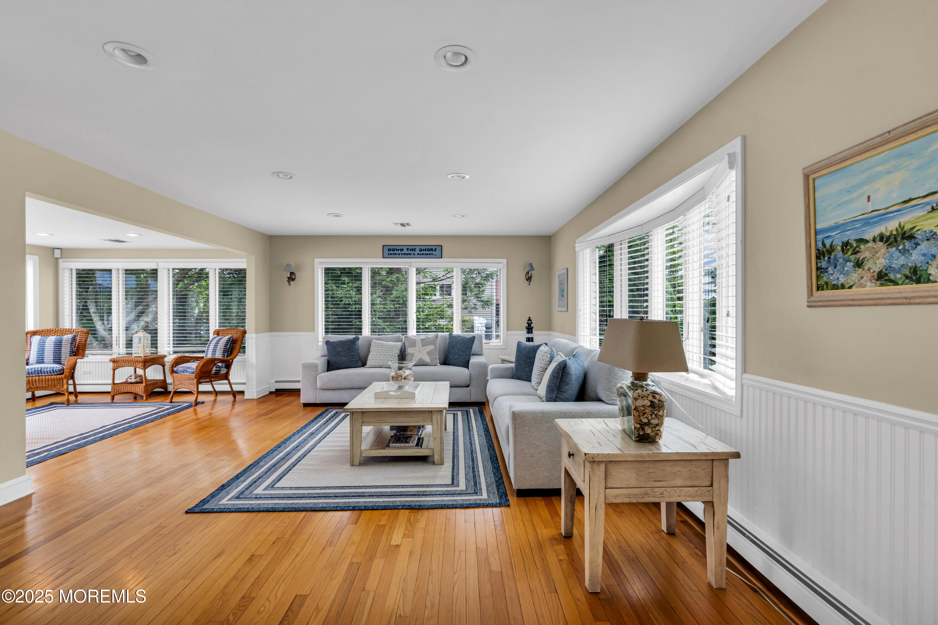 218 3rd Avenue Belmar, NJ 07719 - Photo 5 of 14 a living room with furniture and a large window