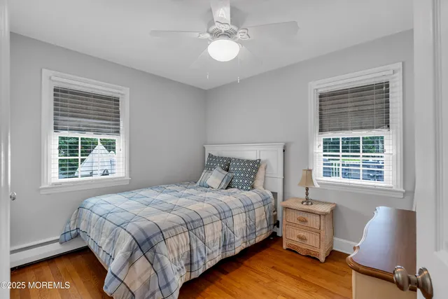 a bedroom with a bed and a chair