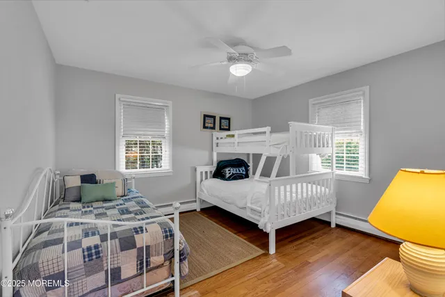 a bedroom with a bed and a table