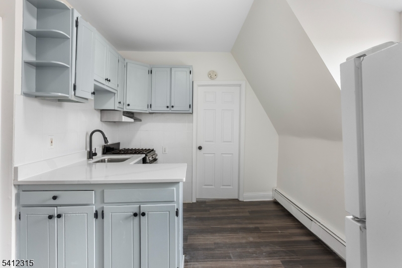 676 Chestnut Street, Unit 3 Kearny, NJ 07032 - Photo 6 of 21 a view of a kitchen with sink and cabinets