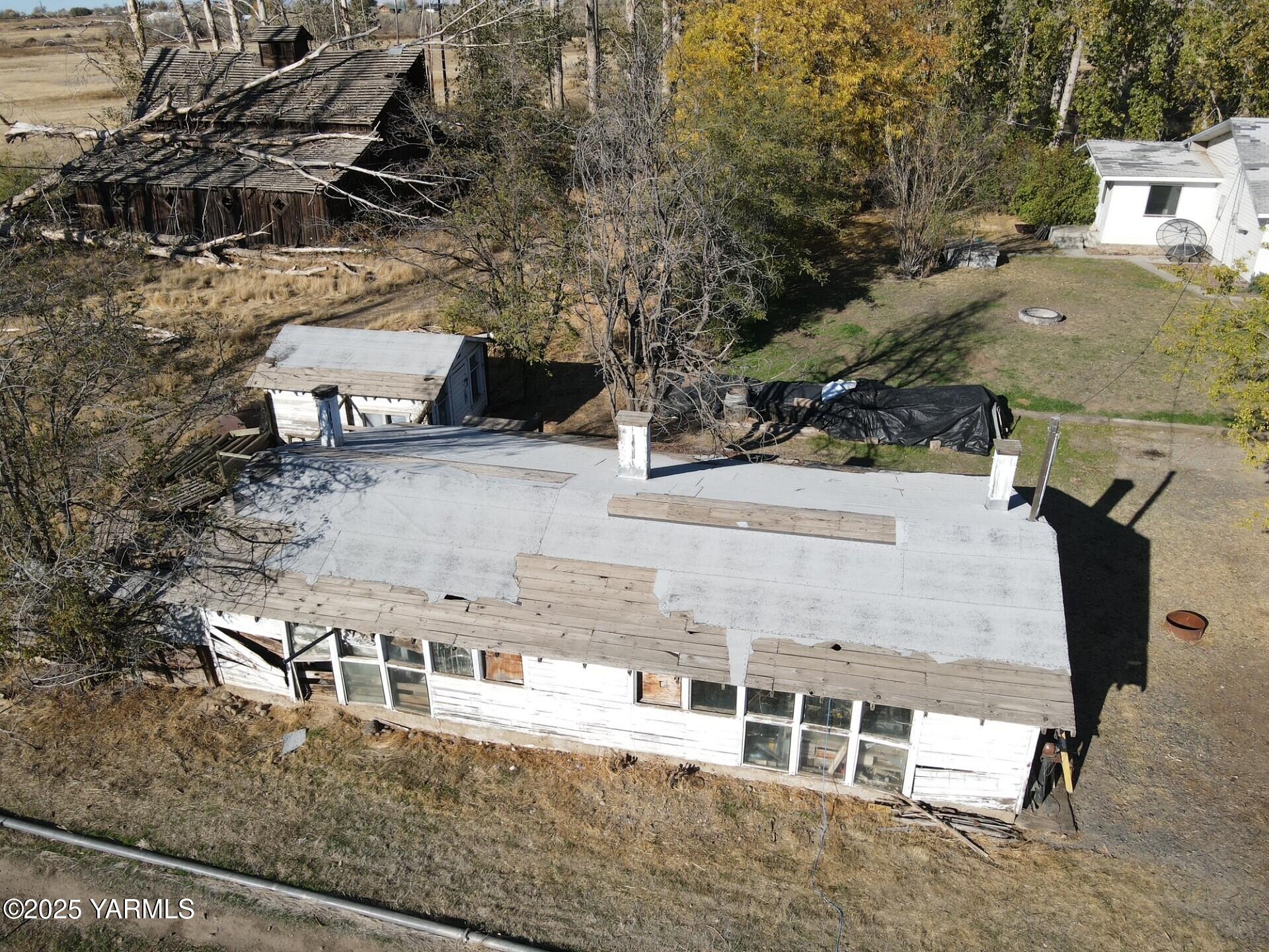 152602 West Atwood Road Prosser, WA 99350 - Photo 14 of 19 an aerial view of a house with a yard