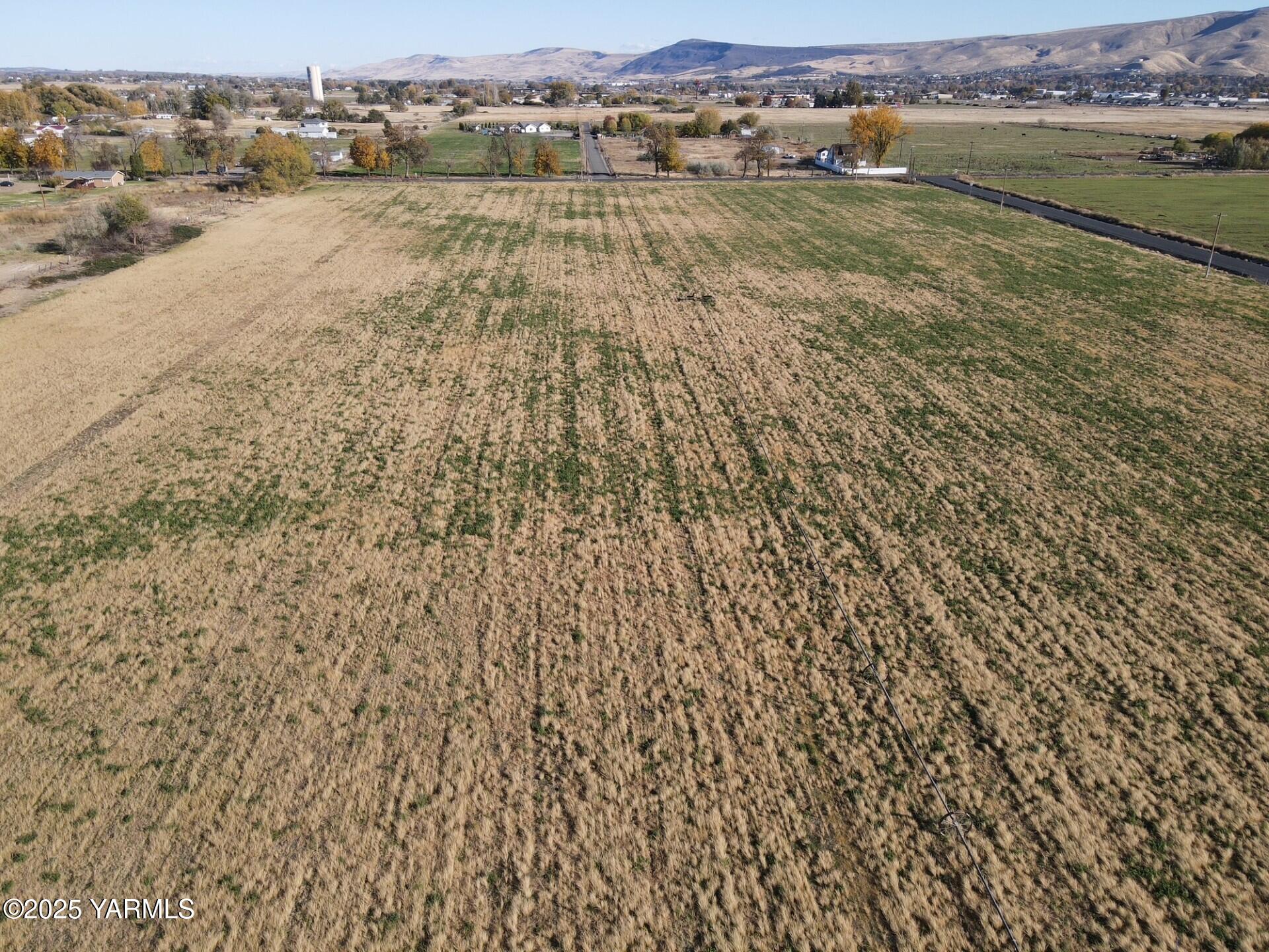 152602 West Atwood Road Prosser, WA 99350 - Photo 18 of 19 an aerial view of residential houses with outdoor space and trees