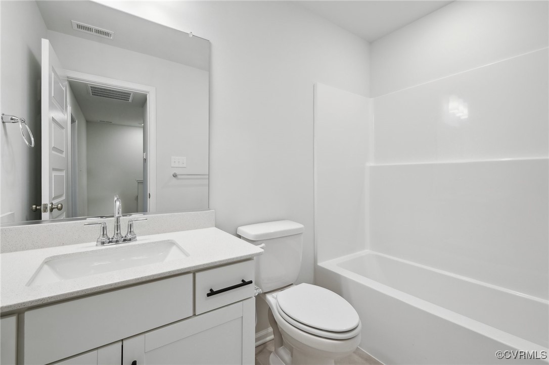 218 That Way Midlothian, VA 23114 - Photo 15 of 22 a bathroom with a sink a toilet and shower