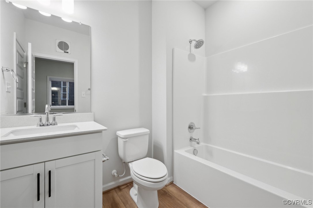 218 That Way Midlothian, VA 23114 - Photo 18 of 22 a bathroom with a sink toilet vanity and shower