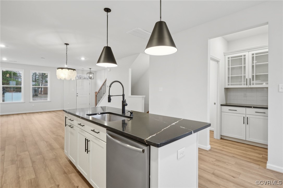 218 That Way Midlothian, VA 23114 - Photo 2 of 22 a kitchen that has a sink a stove and a wooden floor