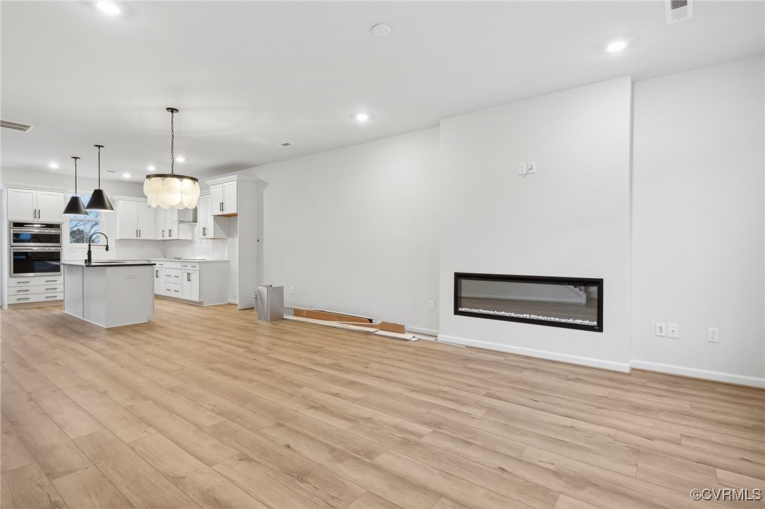 218 That Way Midlothian, VA 23114 - Photo 6 of 22 a view of a kitchen with microwave and stove