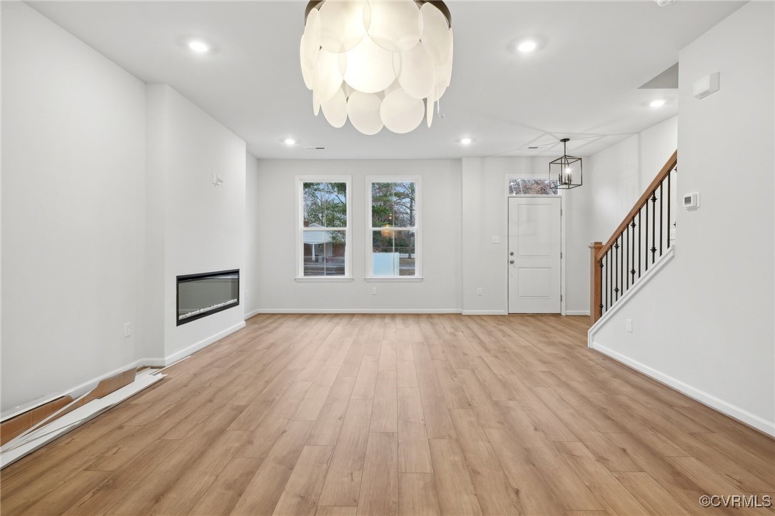 218 That Way Midlothian, VA 23114 - Photo 7 of 22 wooden floor in an empty room with a window
