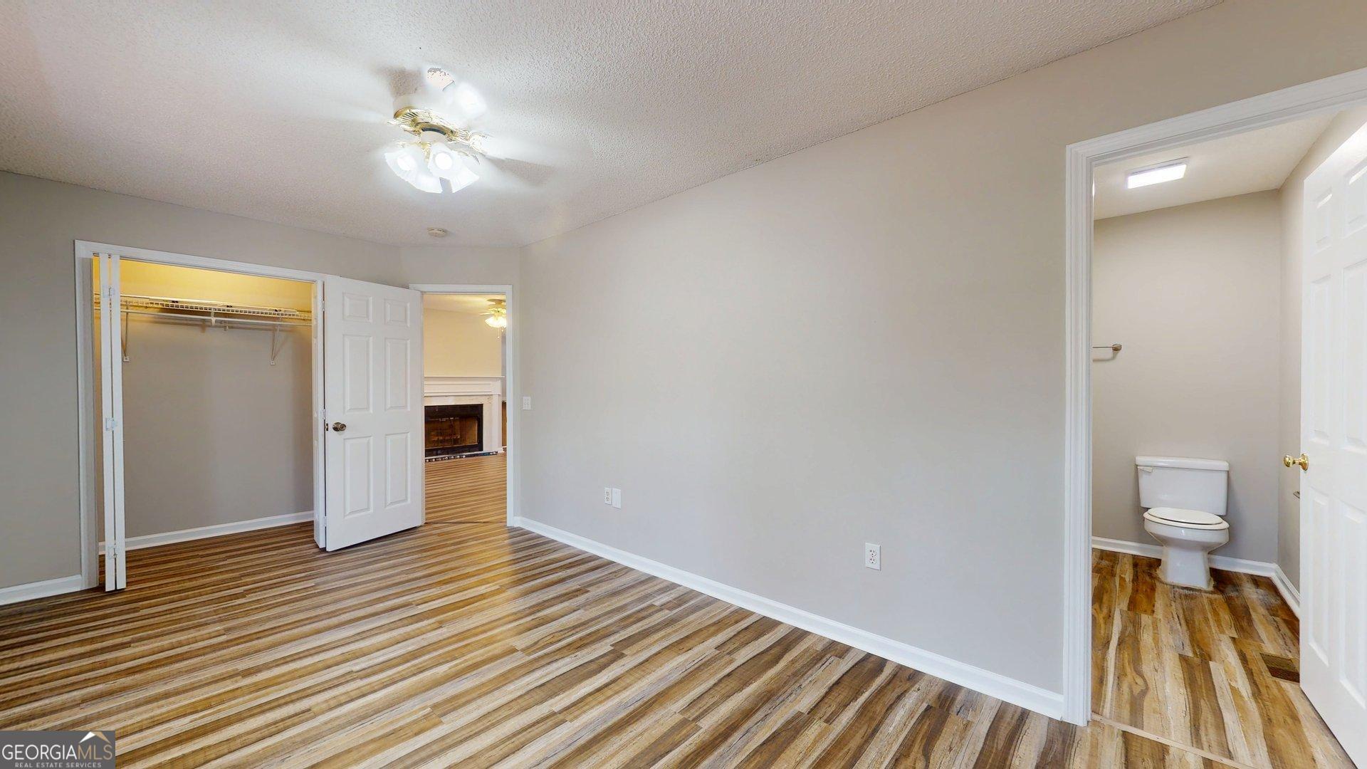 125 Harden Road Statesboro, GA 30458 - Photo 28 of 35 a view of a room with wooden floor and a bathroom