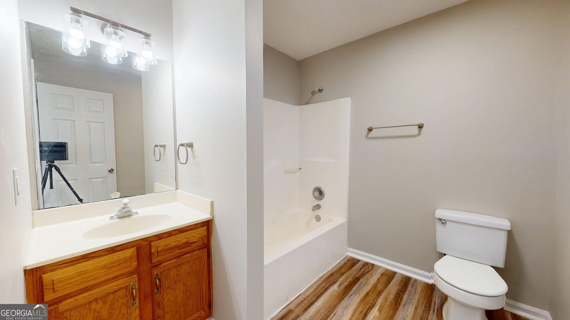 125 Harden Road Statesboro, GA 30458 - Photo 33 of 35 a bathroom with a sink a toilet and shower