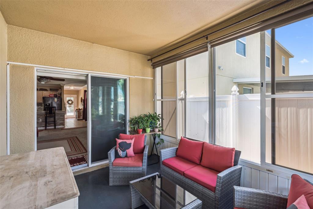 1183 Berkley Ridge Lane Auburndale, FL 33823 - Photo 21 of 25 a living room with furniture and a large window