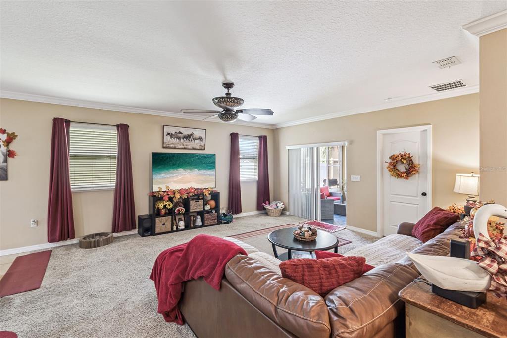1183 Berkley Ridge Lane Auburndale, FL 33823 - Photo 6 of 25 a view of a livingroom with furniture and window