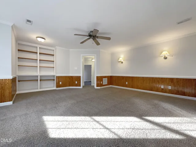 a view of a brick house with a large windows