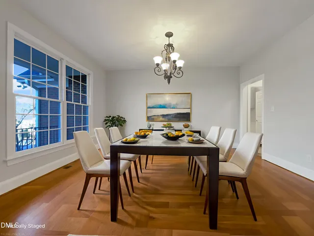 a work room with furniture and wooden floor