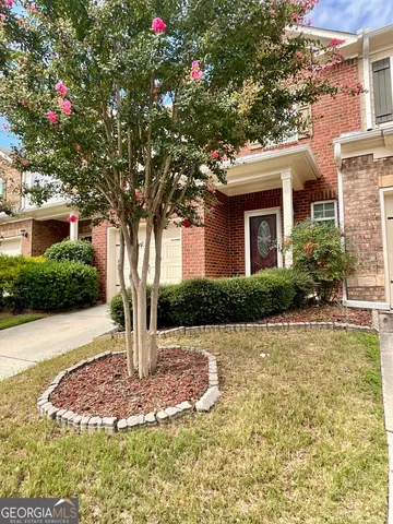 a front view of a house with porch