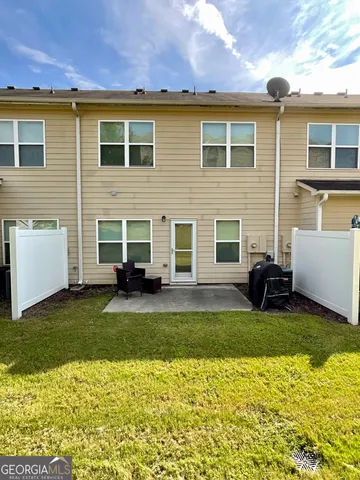 a view of a house with a patio