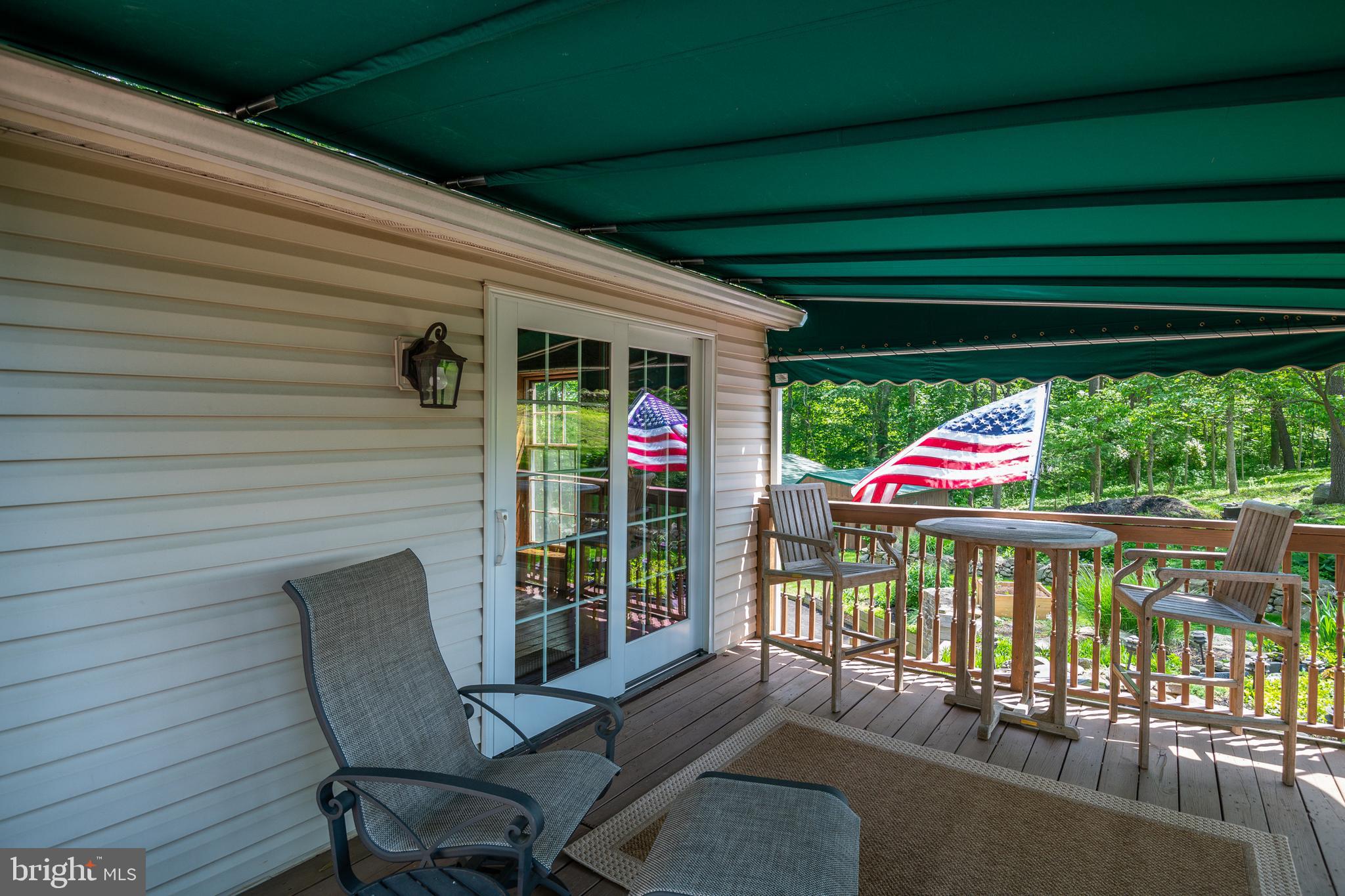 145 Creamery Road Elverson, PA 19520 - Photo 39 of 56 Patio doors from sunroom to deck
