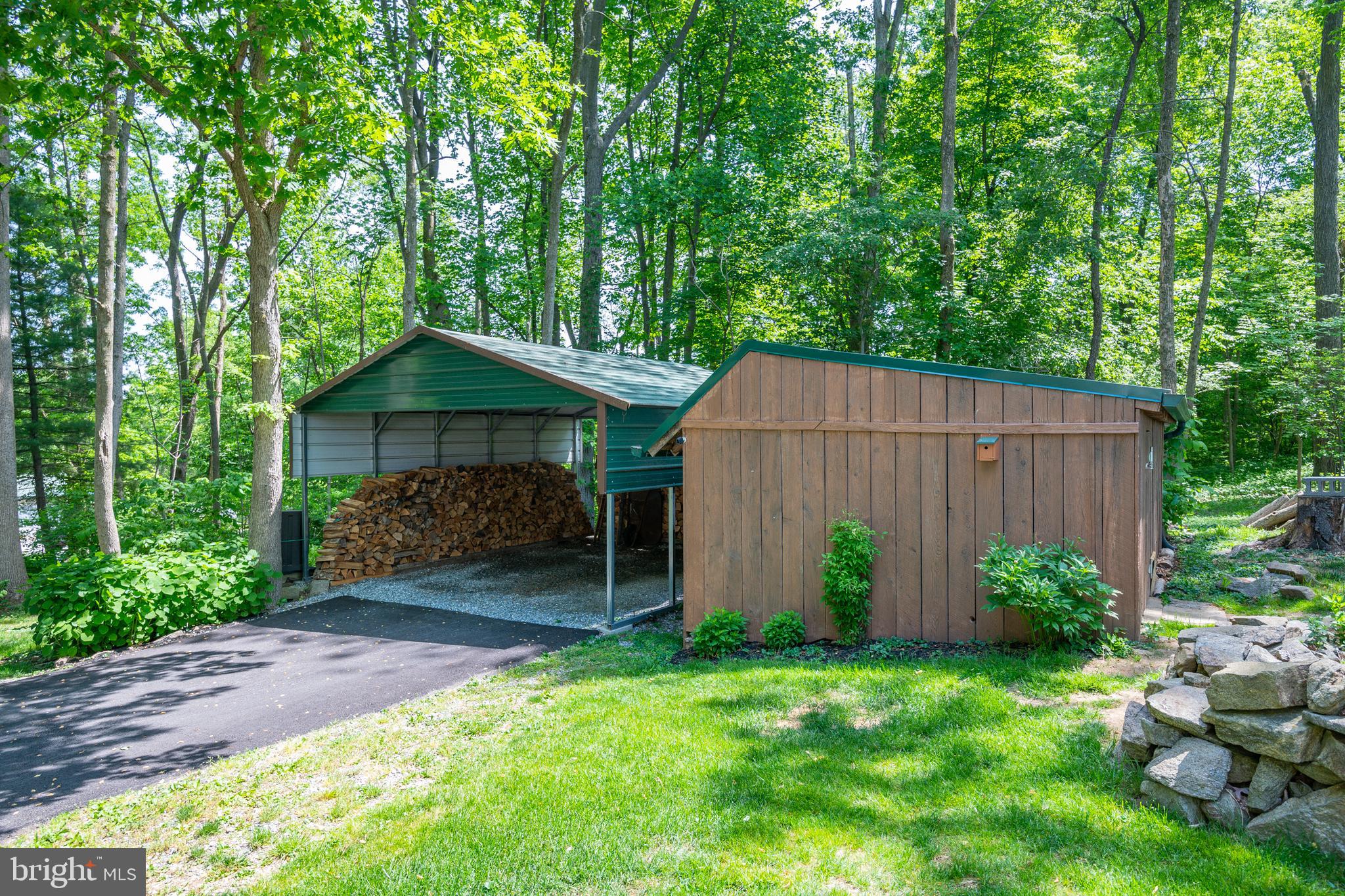 145 Creamery Road Elverson, PA 19520 - Photo 47 of 56 Shed next to car port - great for lawn equpment