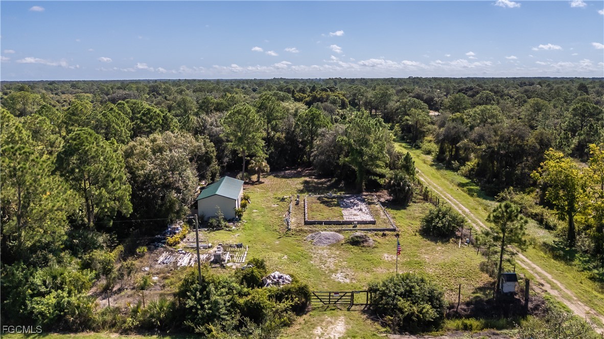 175 South Romero Street Clewiston, FL 33440 - Photo 8 of 19 a view of a lake with a outdoor space
