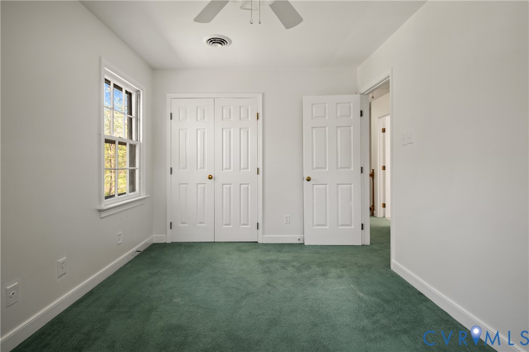 4407 Ketcham Drive Chesterfield, VA 23832 - Photo 21 of 37 an empty room with windows