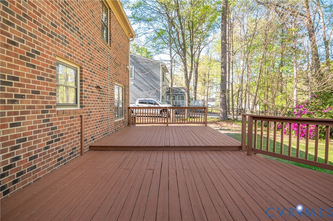 4407 Ketcham Drive Chesterfield, VA 23832 - Photo 25 of 37 a view of outdoor space with wooden floor and trees