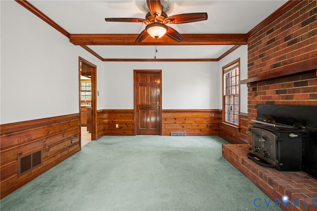 4407 Ketcham Drive Chesterfield, VA 23832 - Photo 5 of 37 a view of an empty room with window and chandelier fan