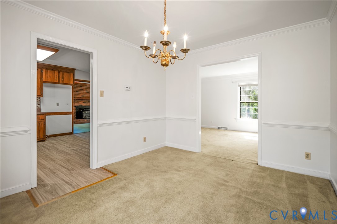 4407 Ketcham Drive Chesterfield, VA 23832 - Photo 10 of 37 wooden floor in an empty room with a window