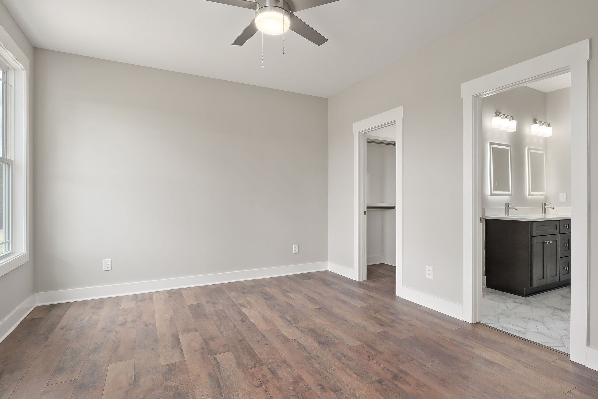 1095 Arch Cope Road Morrison, TN 37357 - Photo 19 of 29 wooden floor in an empty room with a window