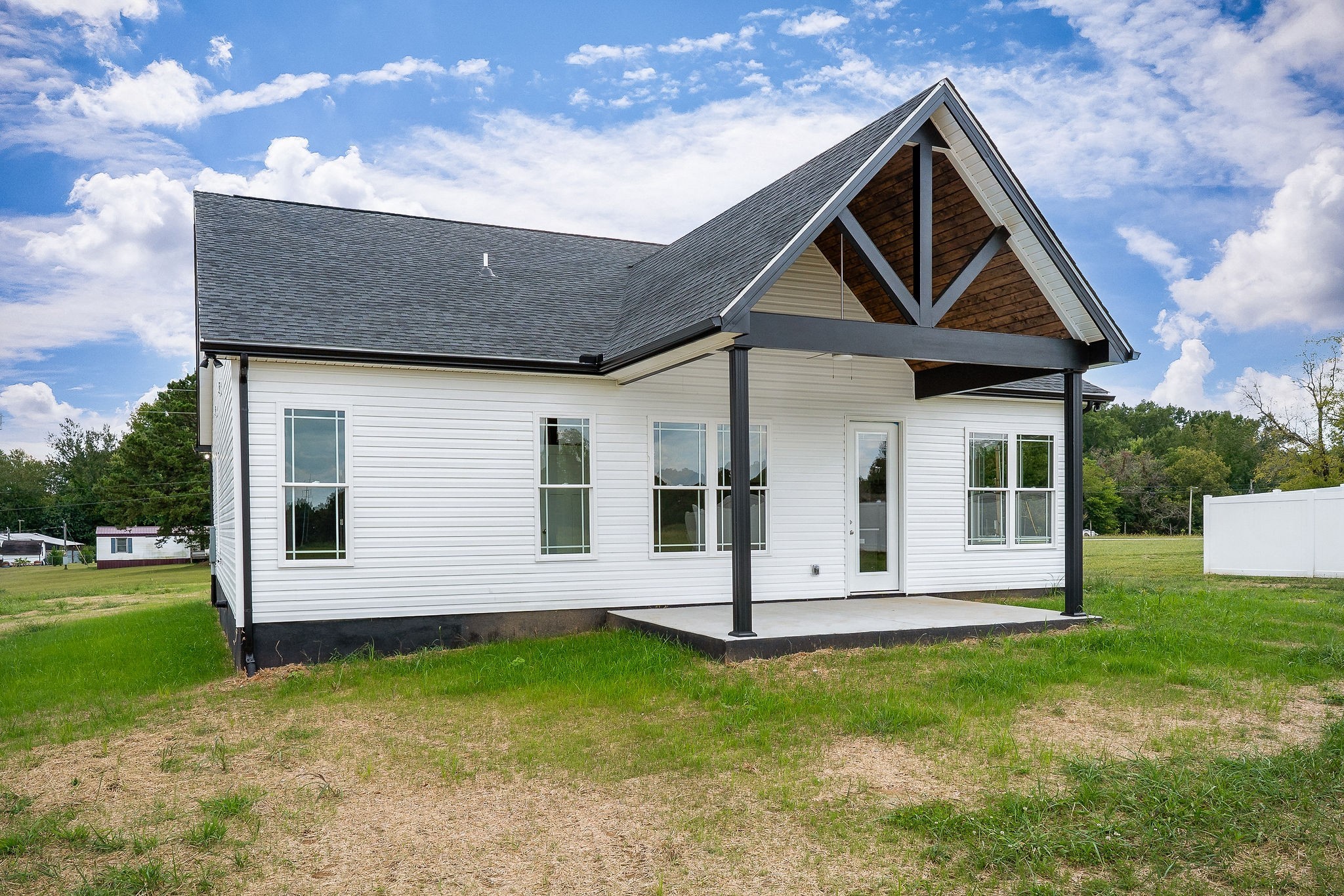 1095 Arch Cope Road Morrison, TN 37357 - Photo 27 of 29 a front view of a house with a yard