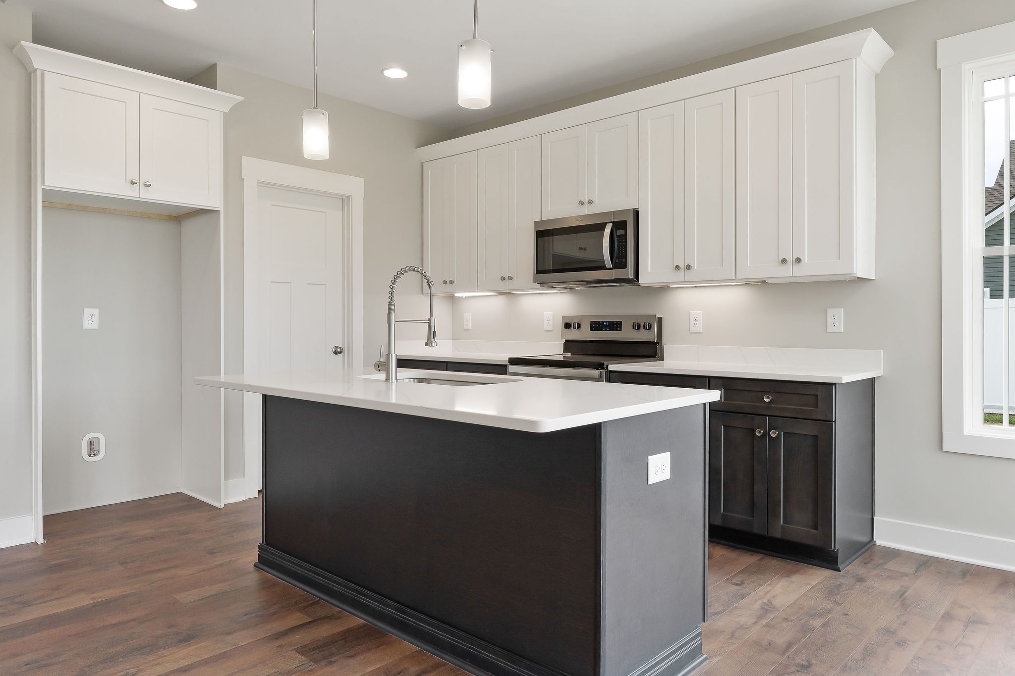 1095 Arch Cope Road Morrison, TN 37357 - Photo 8 of 29 a kitchen with kitchen island granite countertop a sink cabinets and stainless steel appliances