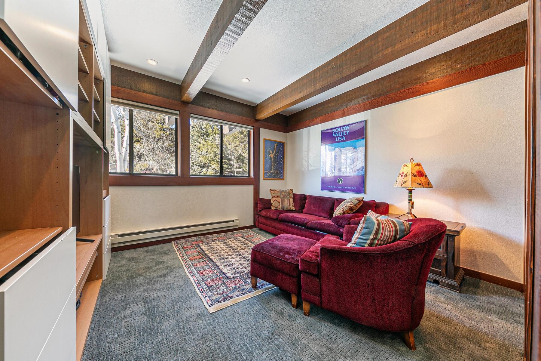 1581 Olympic Vly Road, Unit 3 Olympic Valley, CA 96146 - Photo 18 of 28 a living room with furniture and a window