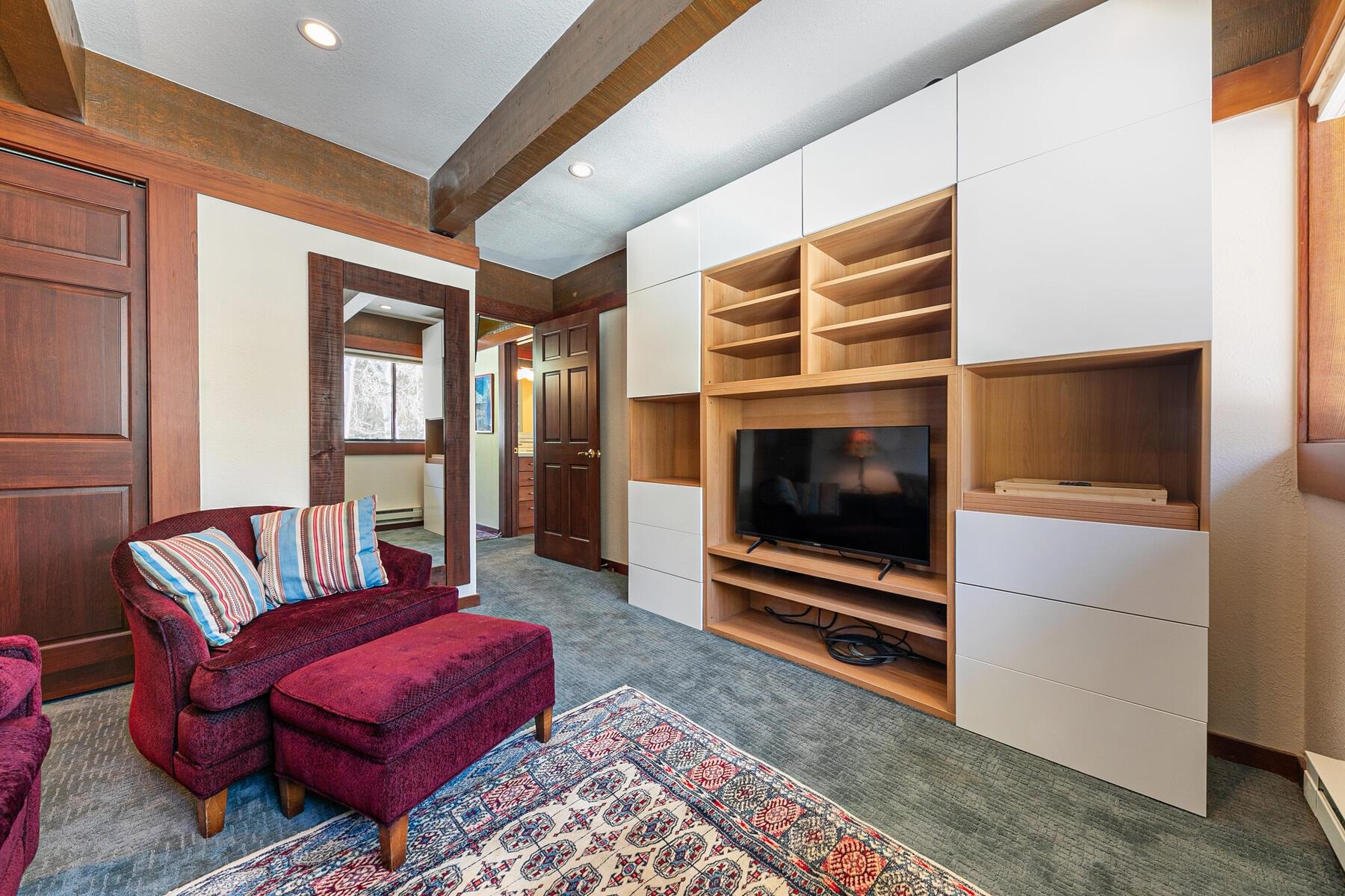 1581 Olympic Vly Road, Unit 3 Olympic Valley, CA 96146 - Photo 19 of 28 a living room with furniture and a flat screen tv