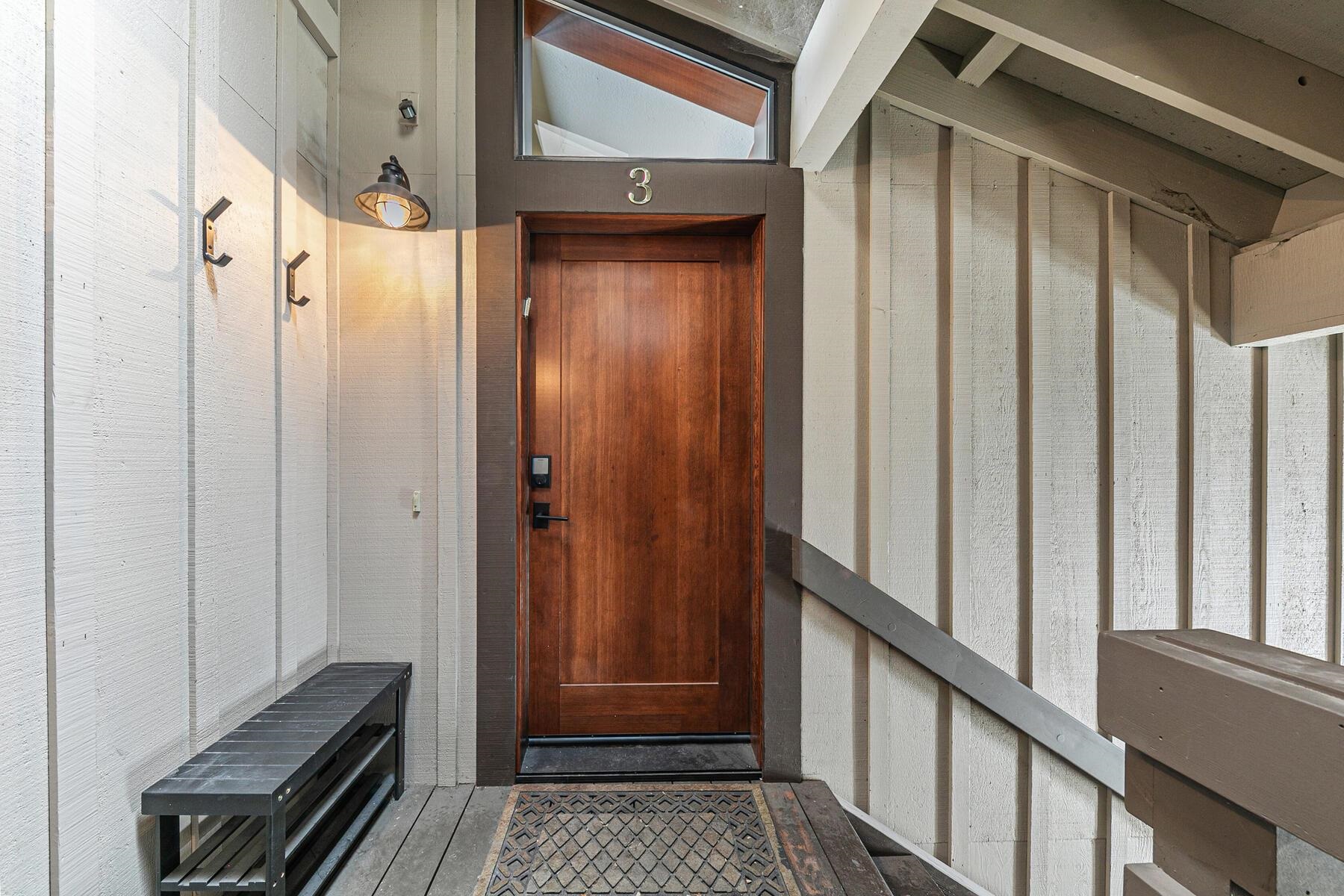 1581 Olympic Vly Road, Unit 3 Olympic Valley, CA 96146 - Photo 21 of 28 a view of a hallway with wooden floor and staircase