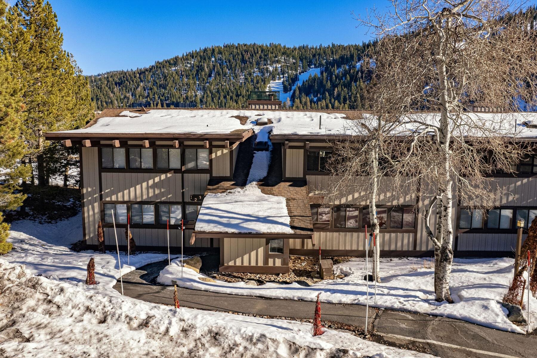1581 Olympic Vly Road, Unit 3 Olympic Valley, CA 96146 - Photo 25 of 28 a view of a house with roof view