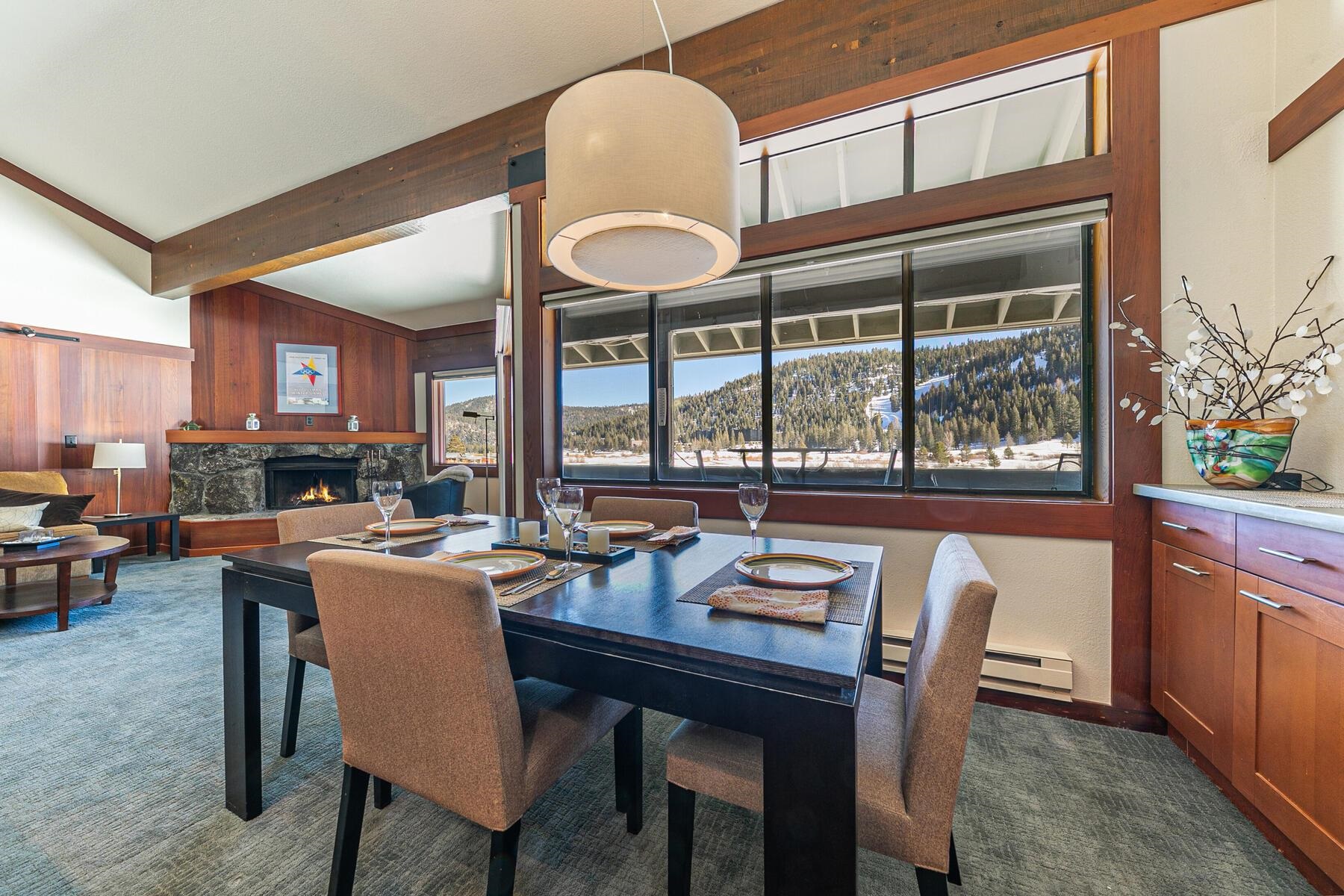 1581 Olympic Vly Road, Unit 3 Olympic Valley, CA 96146 - Photo 6 of 28 a view of a dining room with furniture window and outside view