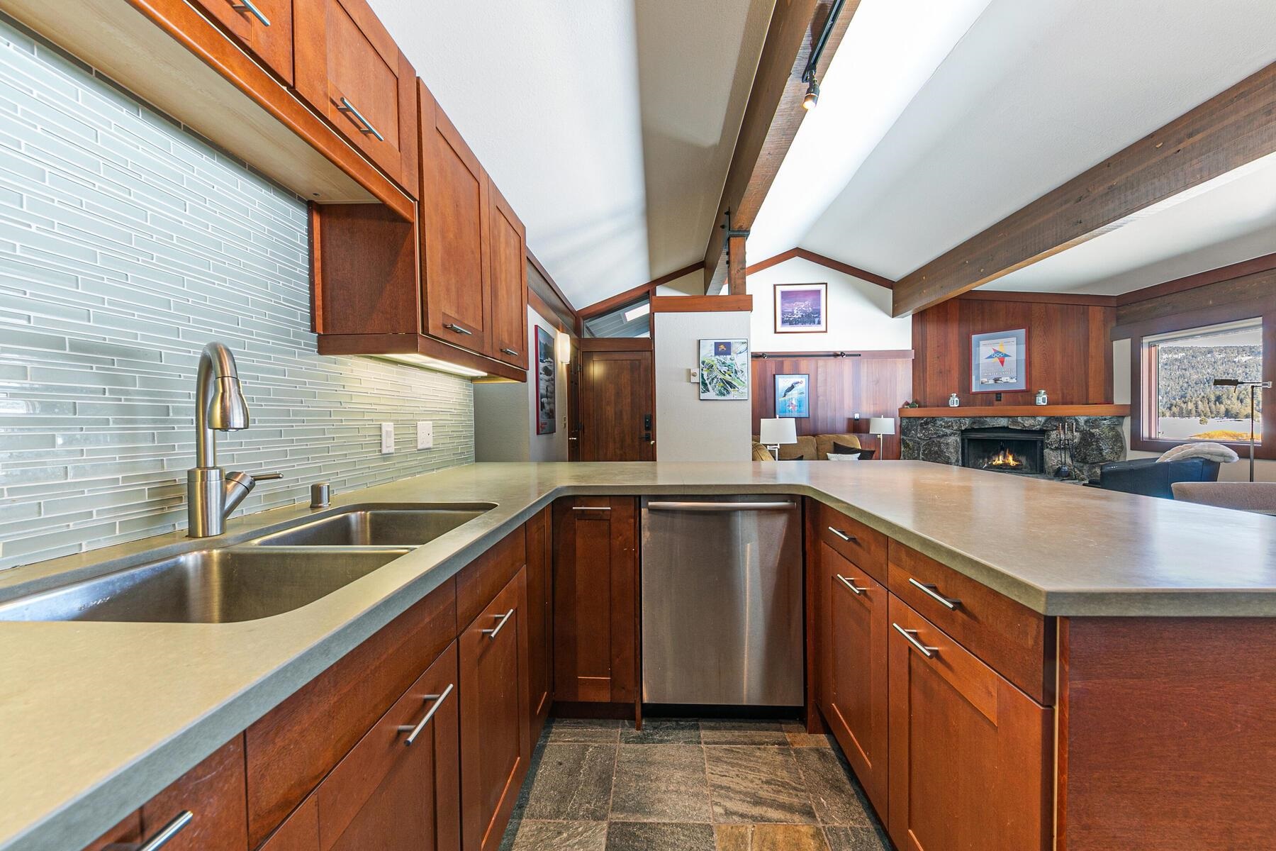 1581 Olympic Vly Road, Unit 3 Olympic Valley, CA 96146 - Photo 9 of 28 a kitchen with stainless steel appliances granite countertop a sink and dishwasher