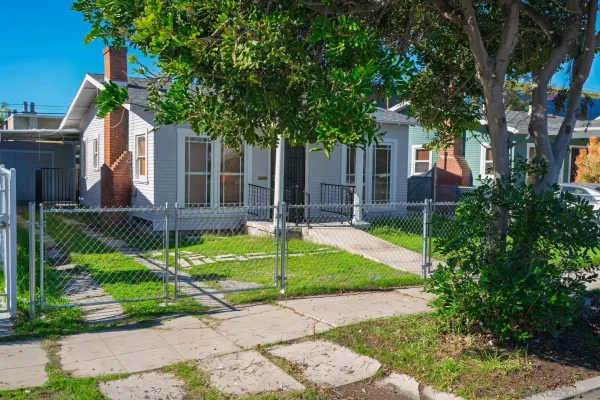 a house with trees in front of it