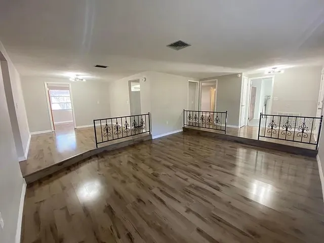 a view of dining room with wooden floor