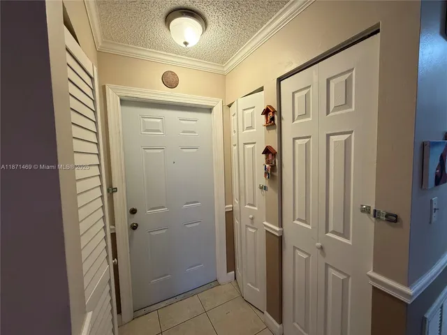 a bathroom with a mirror a shower and a mirror