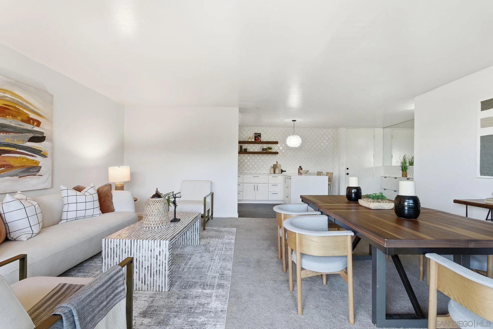 6455 La Jolla Boulevard, Unit 206 La Jolla, CA 92037 - Photo 6 of 24 a living room with furniture and wooden floor