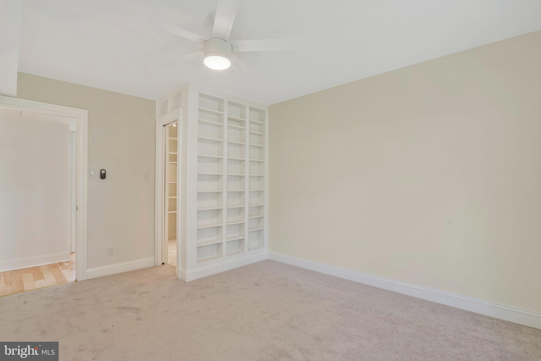 2505 Arlington Boulevard, Unit 102 Arlington, VA 22201 - Photo 18 of 26 an empty room with closet and windows