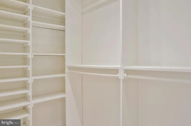 a view of an empty walk in closet